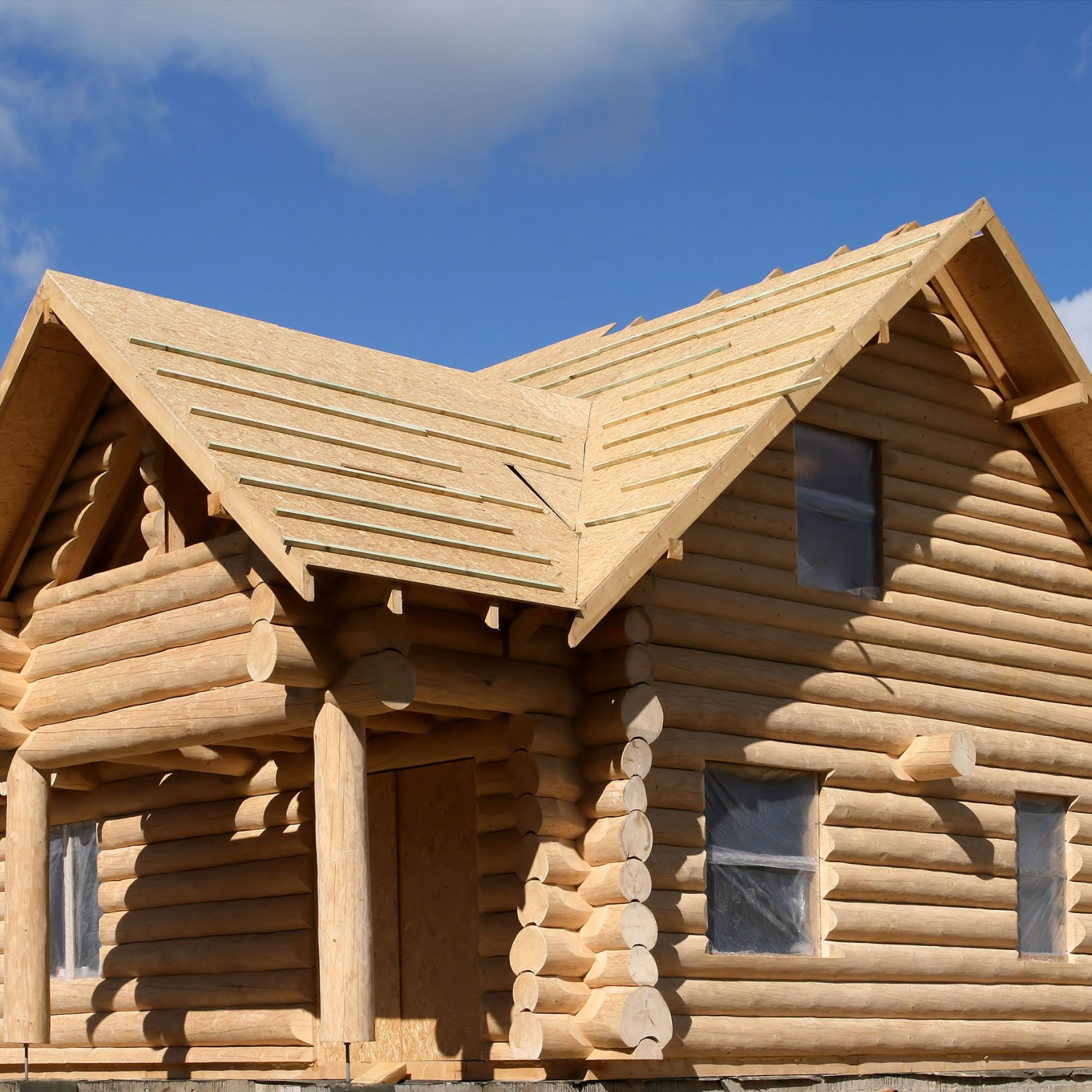 Wooden house construction. Residential architecture. Environment friendly building.